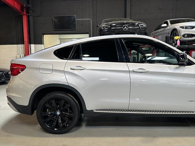 used 2019 BMW X6 car, priced at $28,490