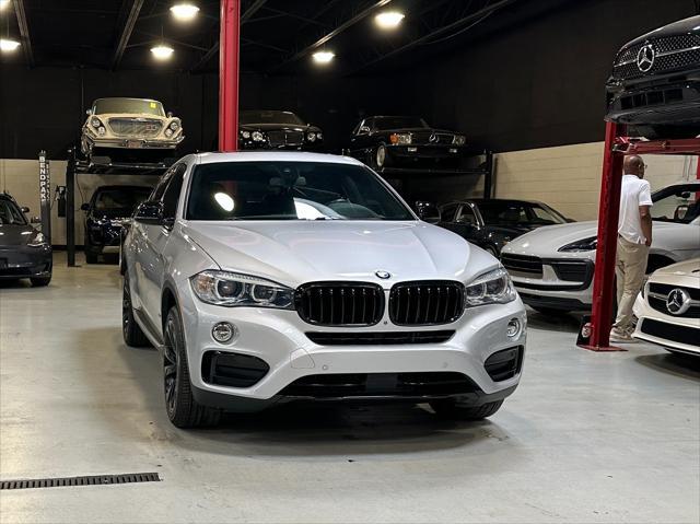 used 2019 BMW X6 car, priced at $28,490