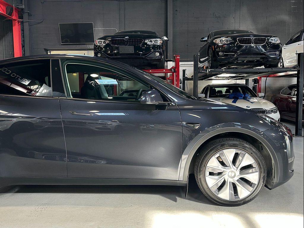 used 2024 Tesla Model Y car, priced at $32,990