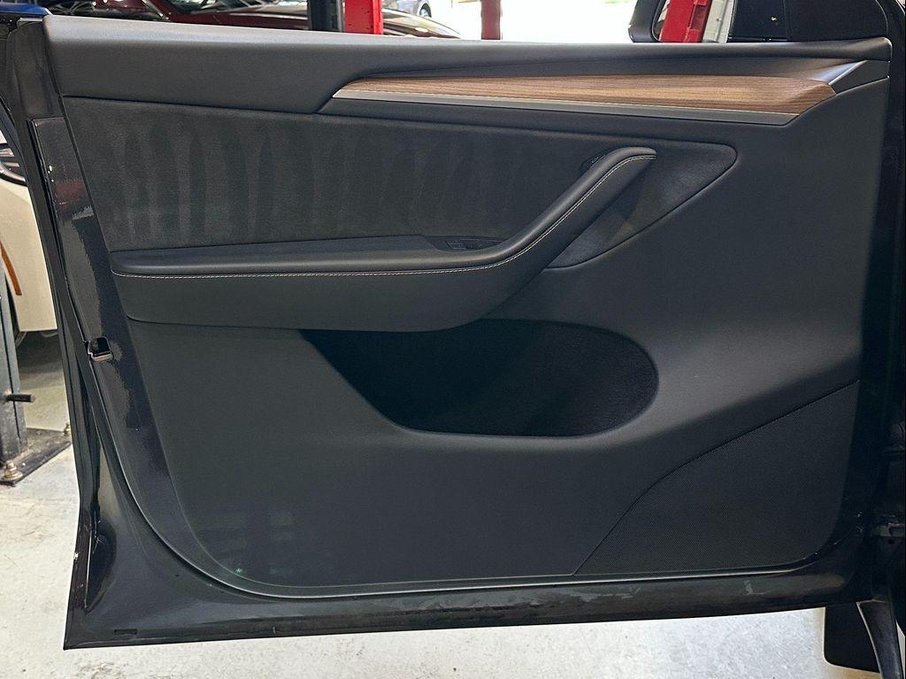 used 2024 Tesla Model Y car, priced at $32,990