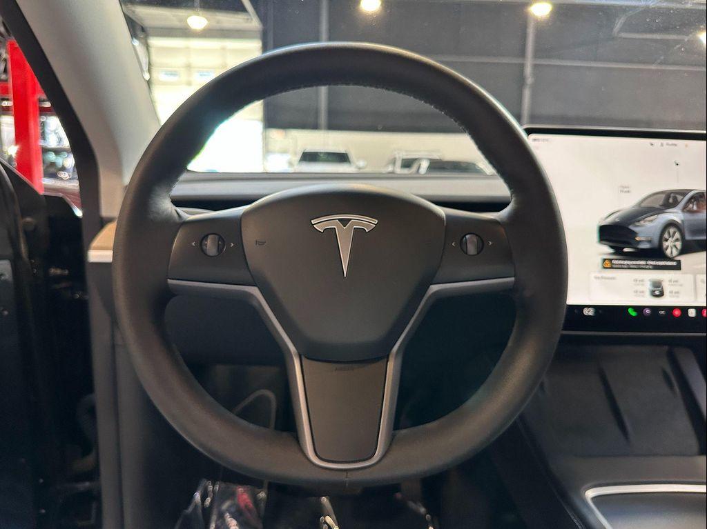 used 2024 Tesla Model Y car, priced at $32,990