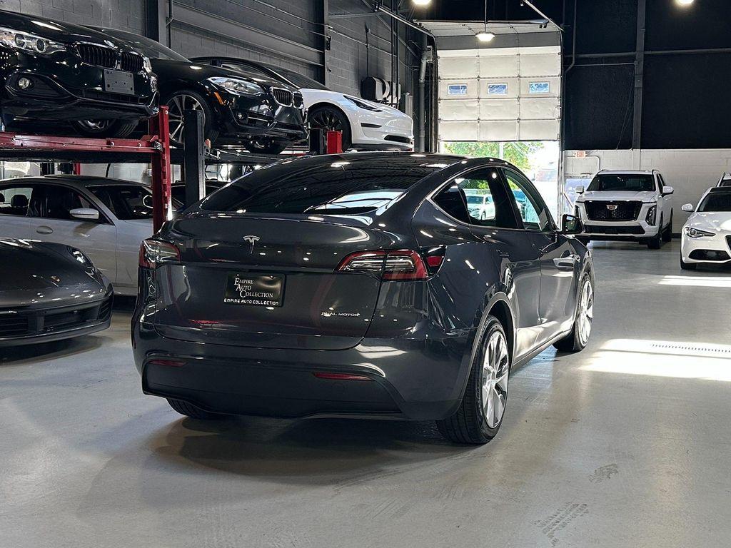 used 2024 Tesla Model Y car, priced at $32,990