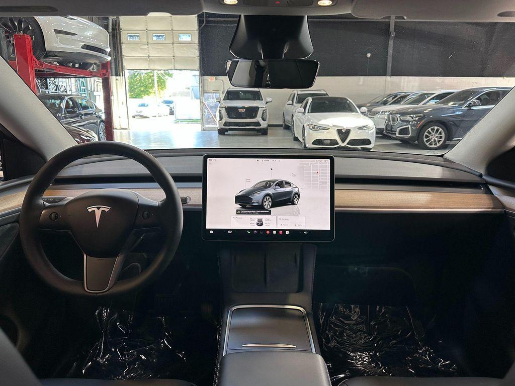 used 2024 Tesla Model Y car, priced at $32,990