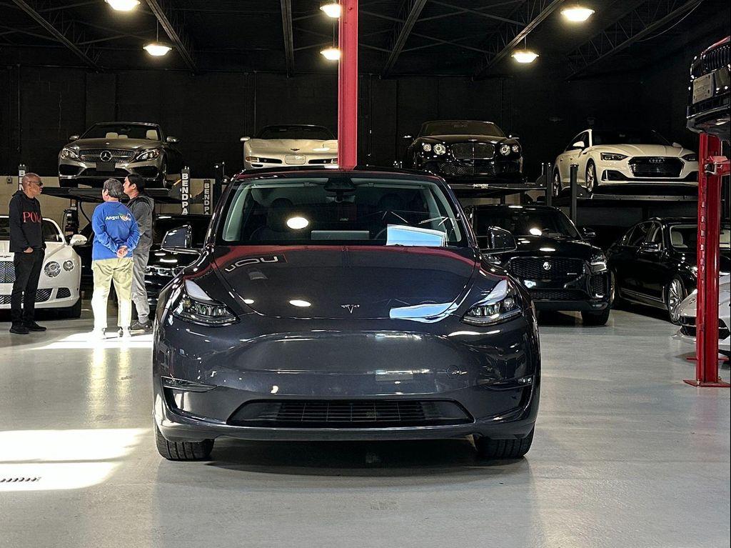 used 2024 Tesla Model Y car, priced at $32,990
