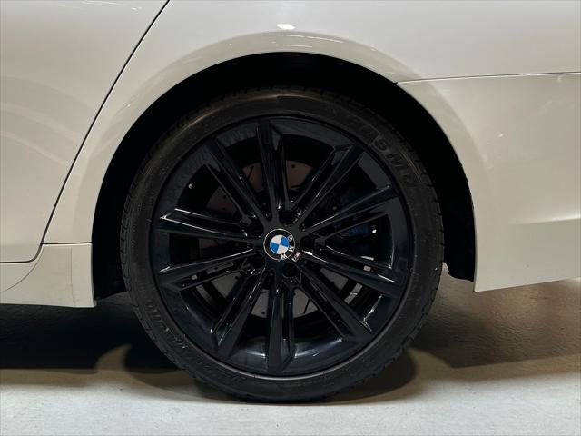 used 2014 BMW 750 car, priced at $13,990