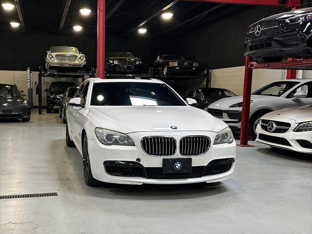used 2014 BMW 750 car, priced at $13,990