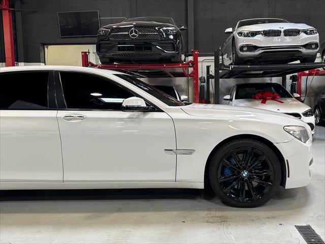 used 2014 BMW 750 car, priced at $13,990