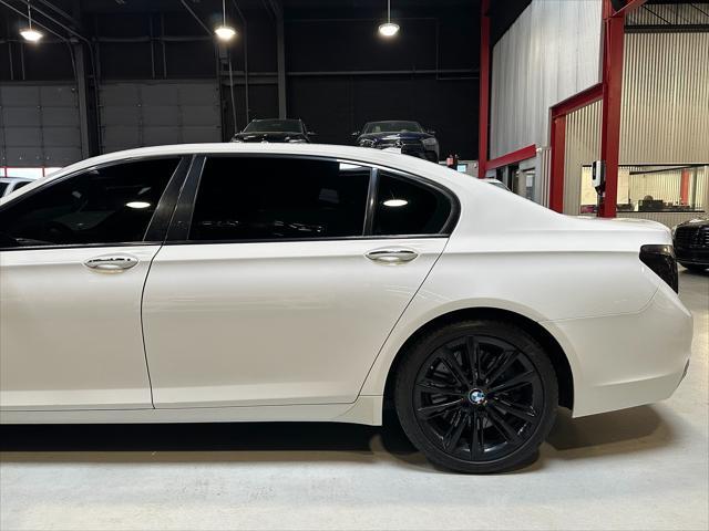 used 2014 BMW 750 car, priced at $13,990