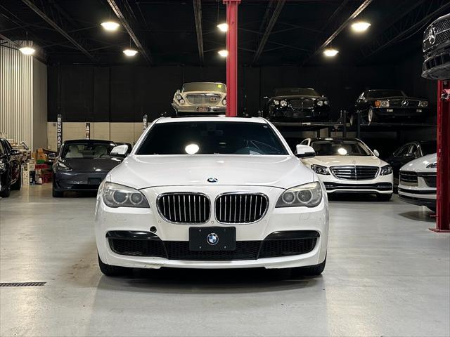 used 2014 BMW 750 car, priced at $13,990