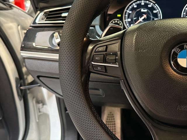 used 2014 BMW 750 car, priced at $13,990