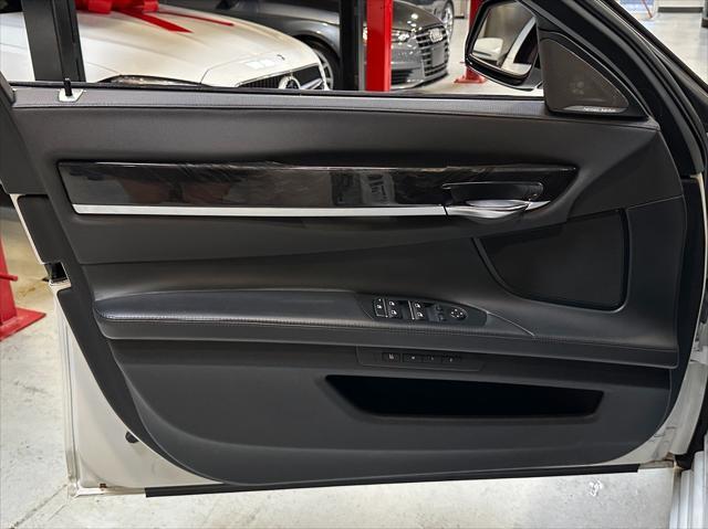 used 2014 BMW 750 car, priced at $13,990
