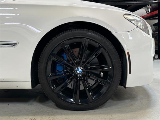 used 2014 BMW 750 car, priced at $13,990