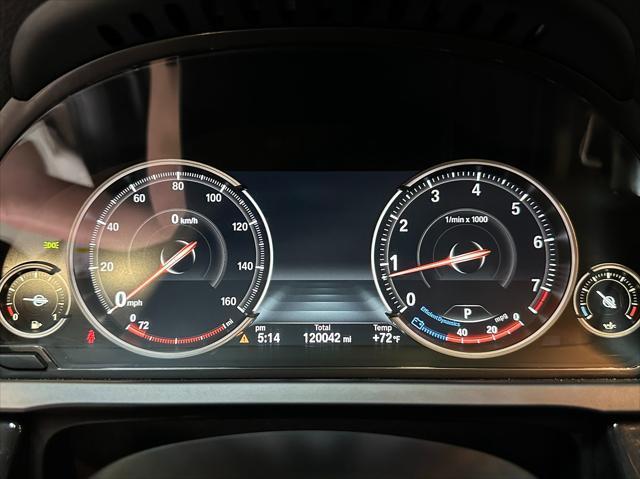 used 2014 BMW 750 car, priced at $13,990