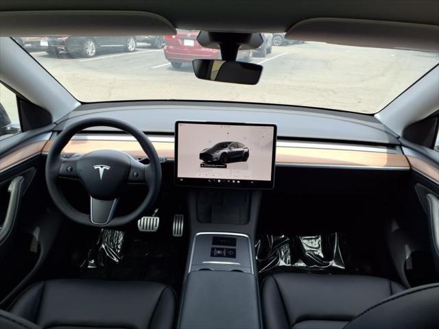 used 2023 Tesla Model Y car, priced at $32,624