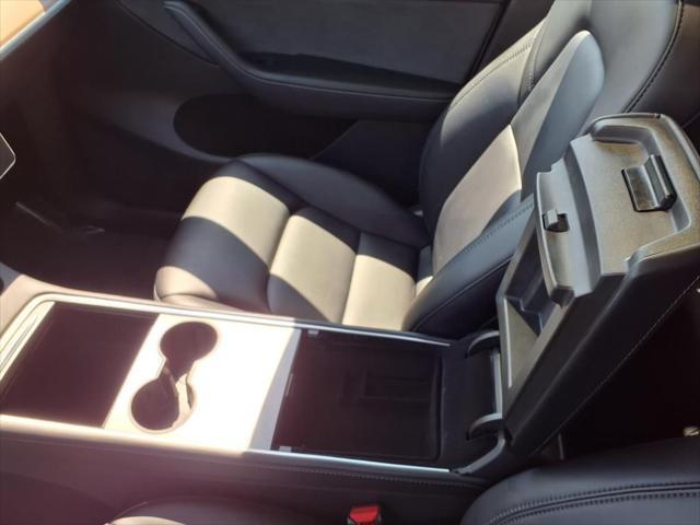 used 2023 Tesla Model Y car, priced at $28,657