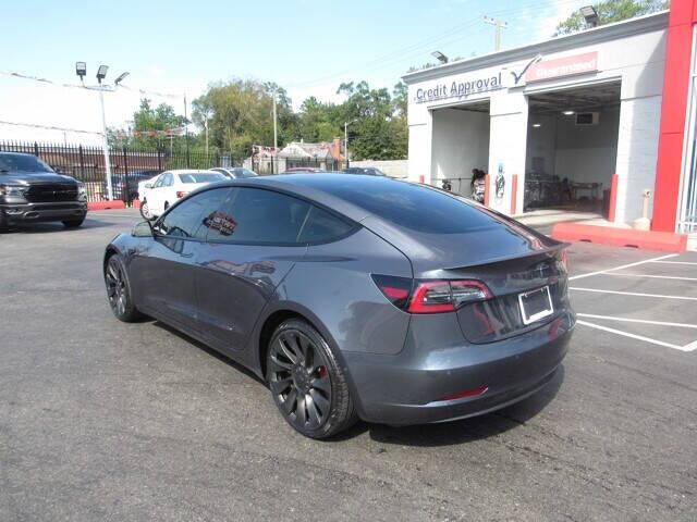 used 2022 Tesla Model 3 car, priced at $32,995