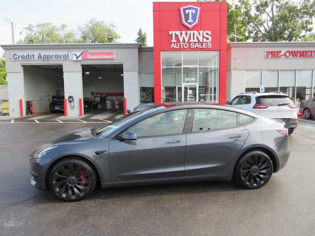 used 2022 Tesla Model 3 car, priced at $31,995