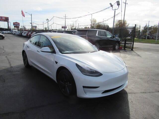 used 2023 Tesla Model 3 car, priced at $27,995