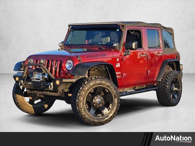used 2010 Jeep Wrangler Unlimited car, priced at $13,392