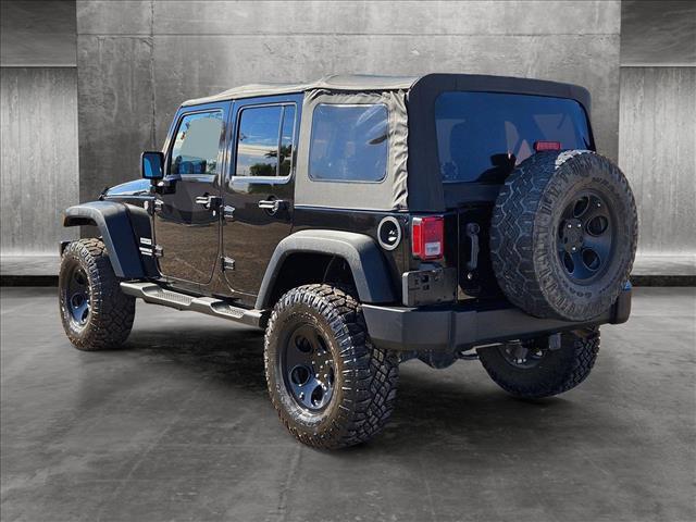 used 2013 Jeep Wrangler Unlimited car, priced at $21,491