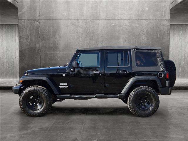 used 2013 Jeep Wrangler Unlimited car, priced at $21,491