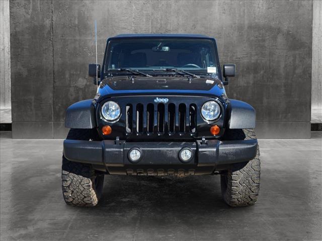 used 2013 Jeep Wrangler Unlimited car, priced at $21,491