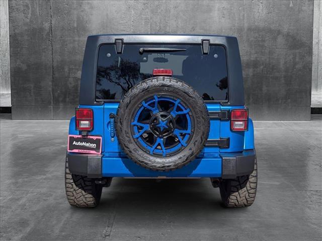 used 2014 Jeep Wrangler Unlimited car, priced at $16,991