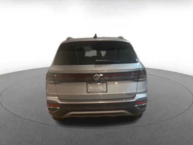used 2025 Volkswagen Taos car, priced at $26,500