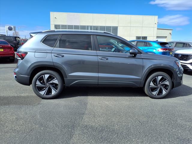 used 2025 Volkswagen Taos car, priced at $32,856