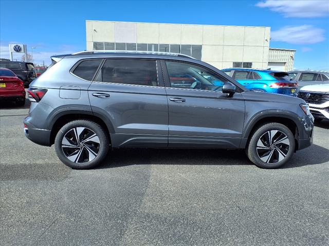used 2025 Volkswagen Taos car, priced at $32,856