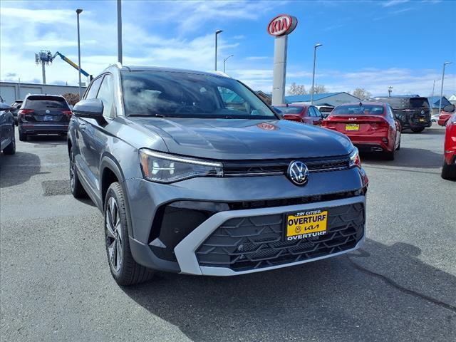 used 2025 Volkswagen Taos car, priced at $32,856