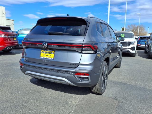 used 2025 Volkswagen Taos car, priced at $32,856