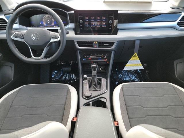 new 2025 Volkswagen Taos car, priced at $28,696
