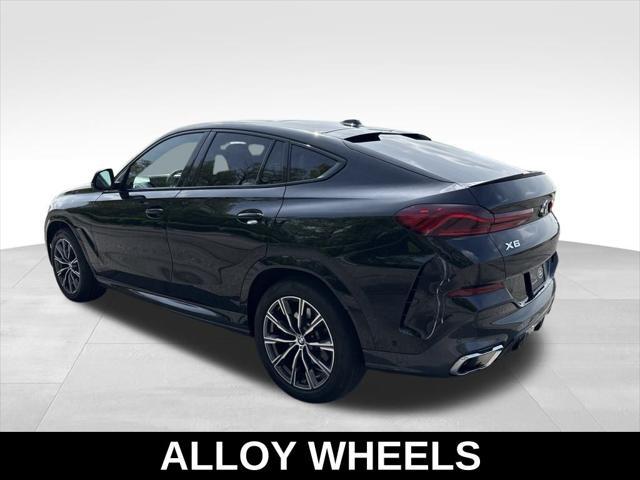 used 2024 BMW X6 car, priced at $65,947