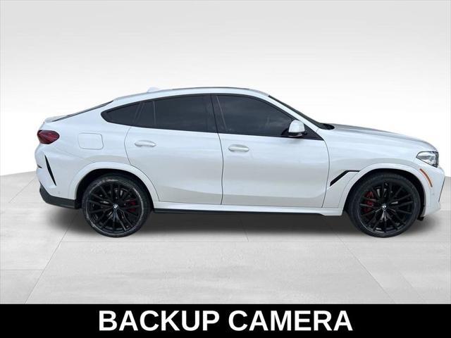 used 2022 BMW X6 car, priced at $54,997