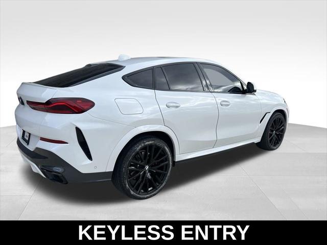 used 2022 BMW X6 car, priced at $54,997