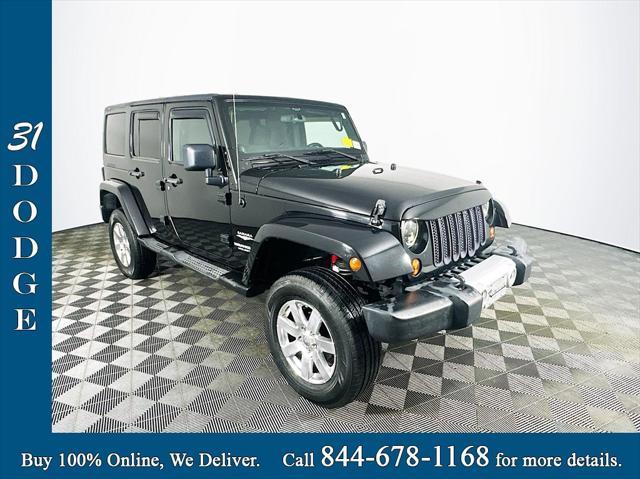 used 2012 Jeep Wrangler Unlimited car, priced at $16,685