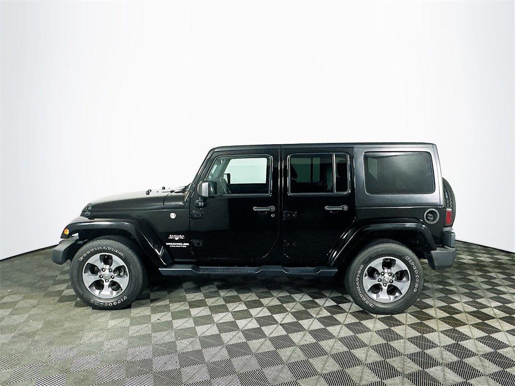 used 2016 Jeep Wrangler Unlimited car, priced at $19,485