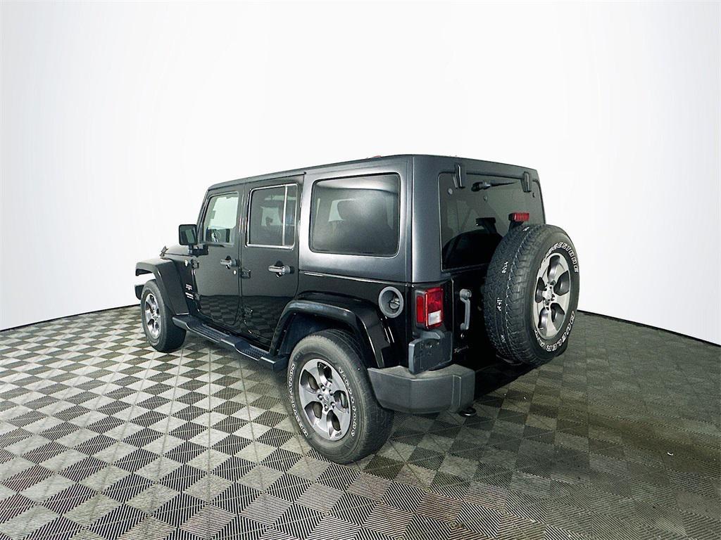 used 2016 Jeep Wrangler Unlimited car, priced at $19,485
