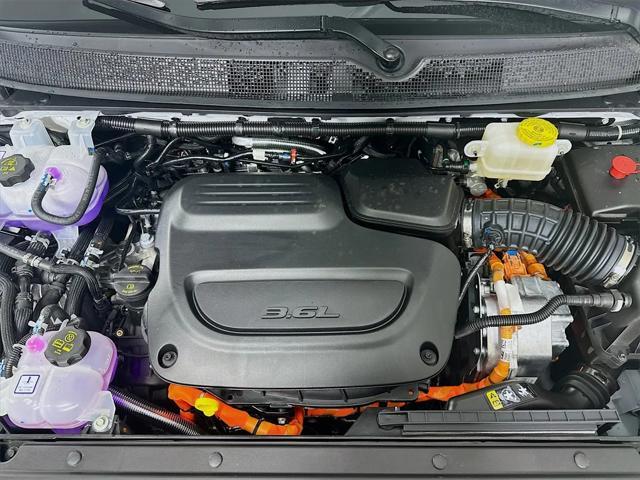 new 2025 Chrysler Pacifica Hybrid car, priced at $54,597