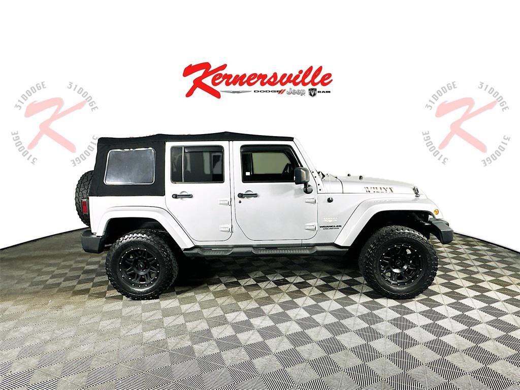 used 2011 Jeep Wrangler Unlimited car, priced at $11,585