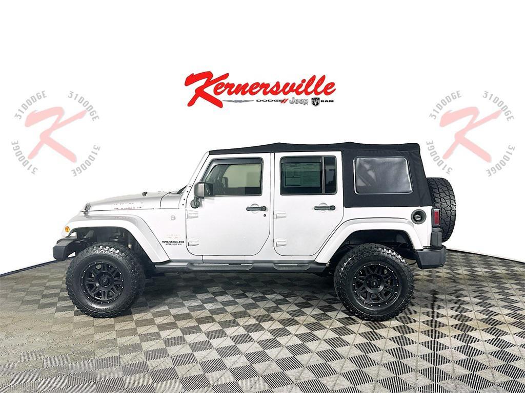 used 2011 Jeep Wrangler Unlimited car, priced at $11,585
