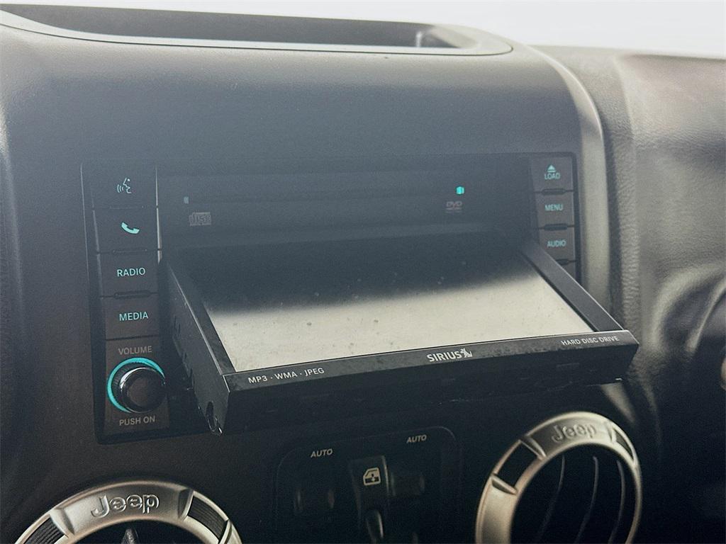 used 2011 Jeep Wrangler Unlimited car, priced at $11,585