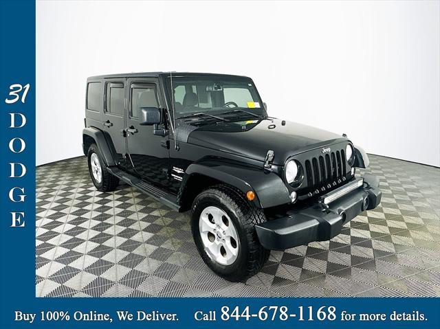 used 2015 Jeep Wrangler Unlimited car, priced at $18,485