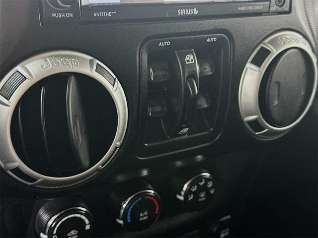 used 2015 Jeep Wrangler Unlimited car, priced at $21,577