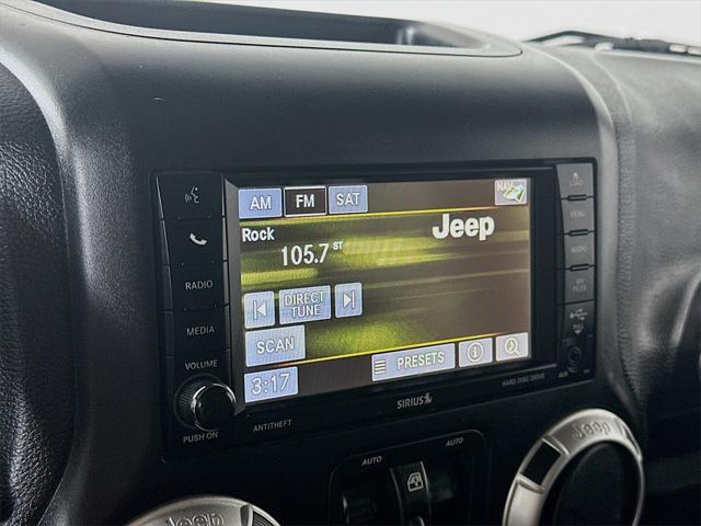 used 2015 Jeep Wrangler Unlimited car, priced at $21,577