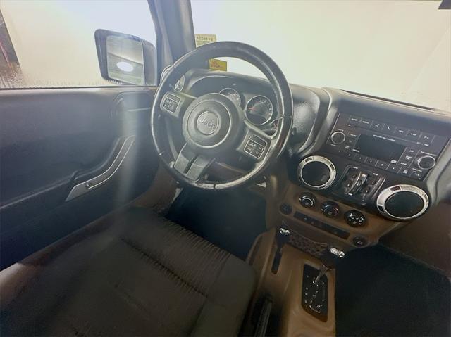 used 2012 Jeep Wrangler Unlimited car, priced at $15,685