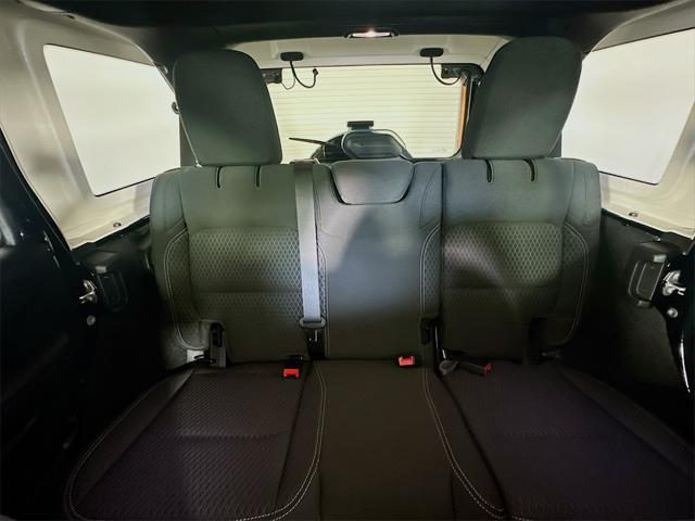 used 2021 Jeep Wrangler Unlimited car, priced at $33,335