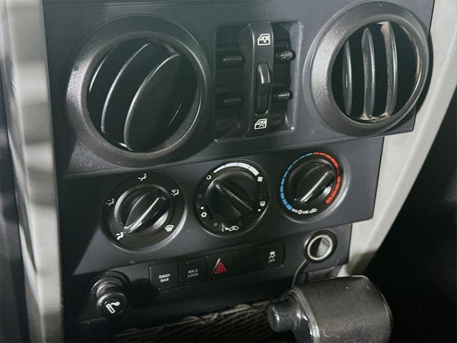 used 2010 Jeep Wrangler Unlimited car, priced at $13,485