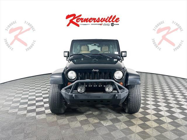 used 2012 Jeep Wrangler Unlimited car, priced at $15,485